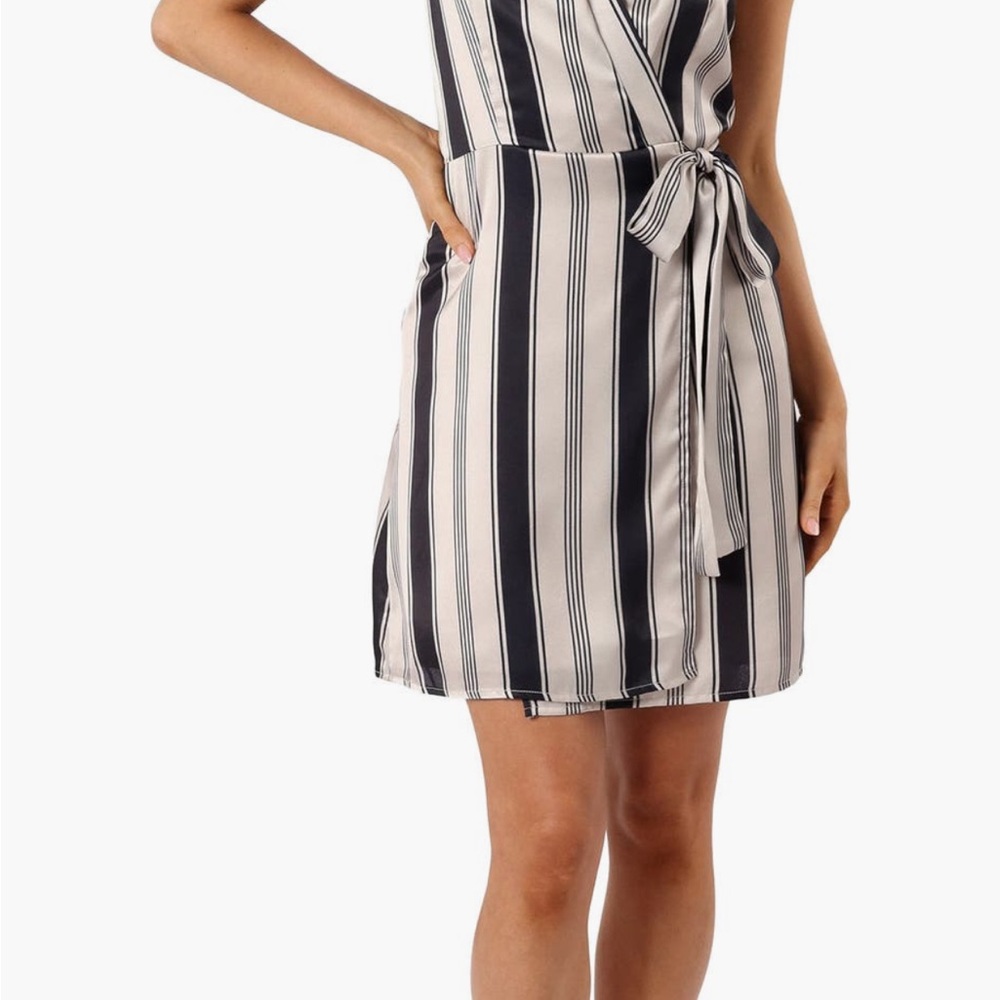 Striped Black and White Mini Dress size small never worn. New with tags.